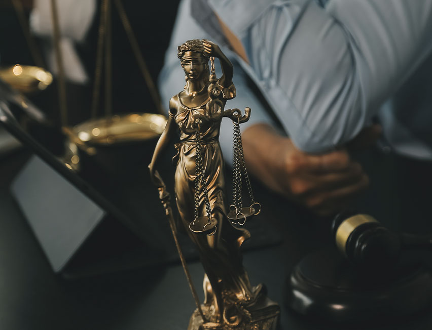 business lawyers discussing contract papers with brass scale desk office law legal services advice justice law concept picture with film grain effect 1